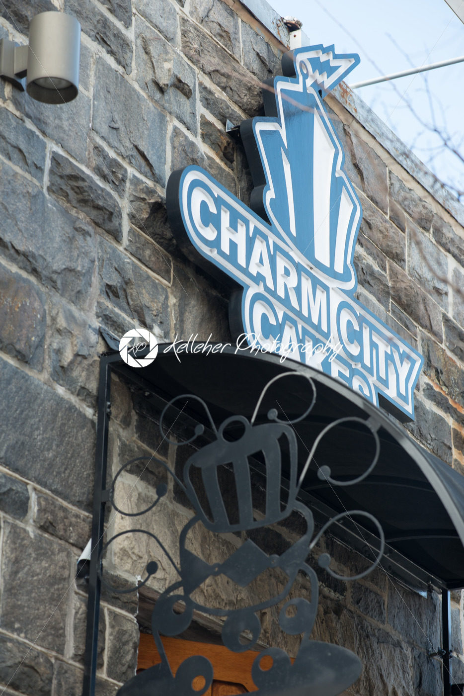BALTIMORE, MARYLAND – FEBRUARY 18: Sign overhead of Charm City Cakes on February 18, 2017 - Kelleher Photography Store