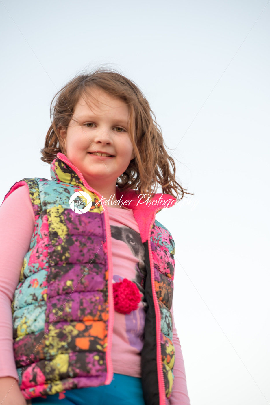 Beautiful young girl outside smiling at sunset golden hour - Kelleher Photography Store