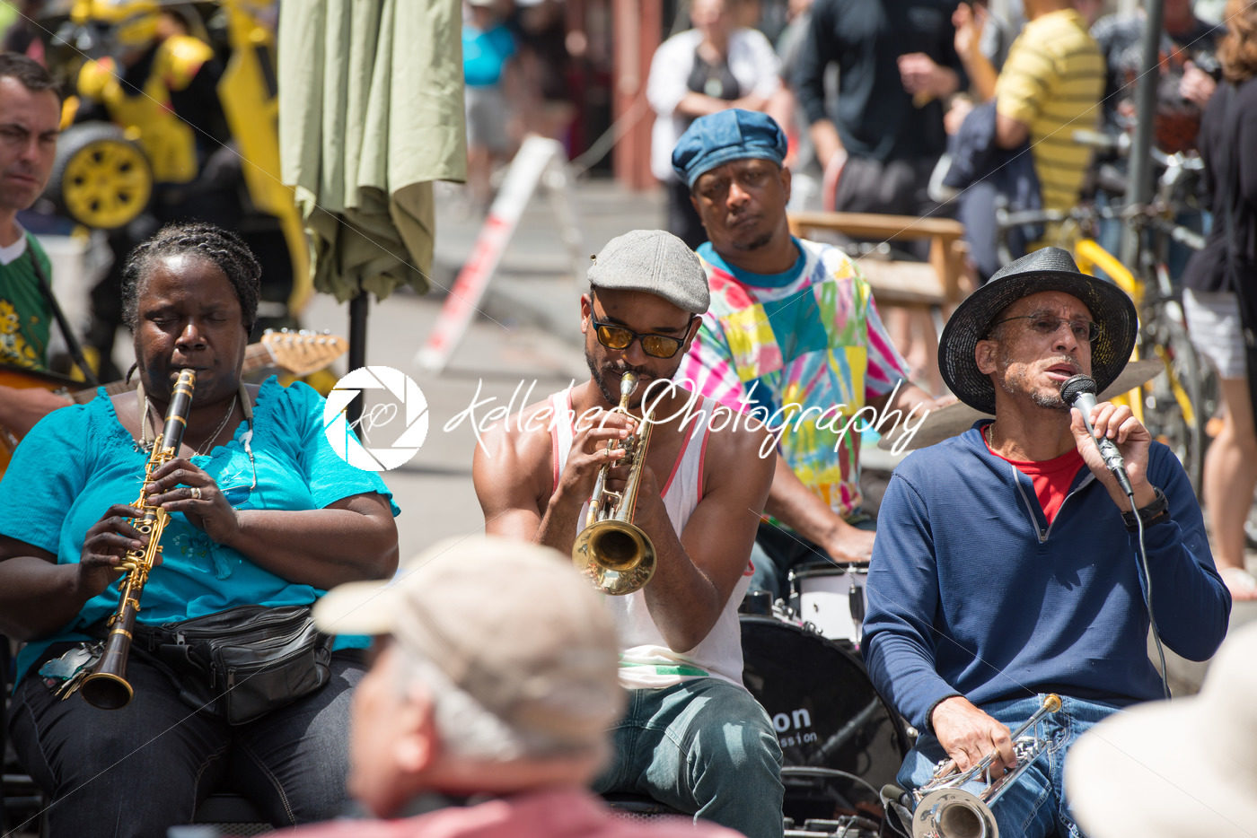 NEW ORLEANS – APRIL 13: In New Orleans, a jazz band plays jazz melodies in the street for donations from the tourists and locals passing by on April 13, 2014 - Kelleher Photography Store