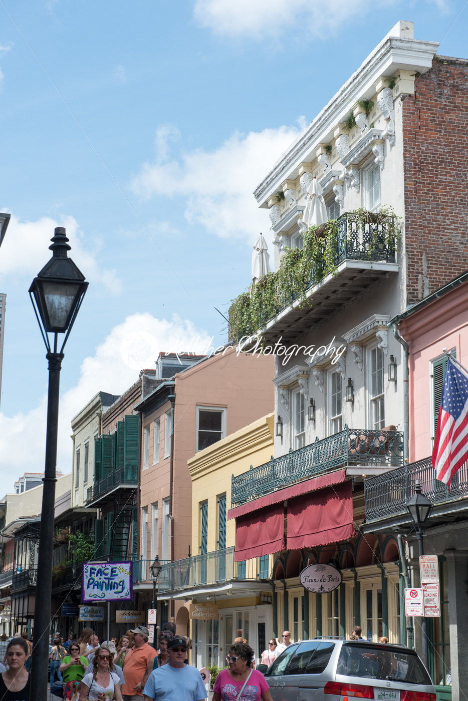 NEW ORLEANS, LA – APRIL 13: Street in the French Quarter of New Orleans, Louisiana showing historic buldings with unique architecture on April 13, 2014 - Kelleher Photography Store
