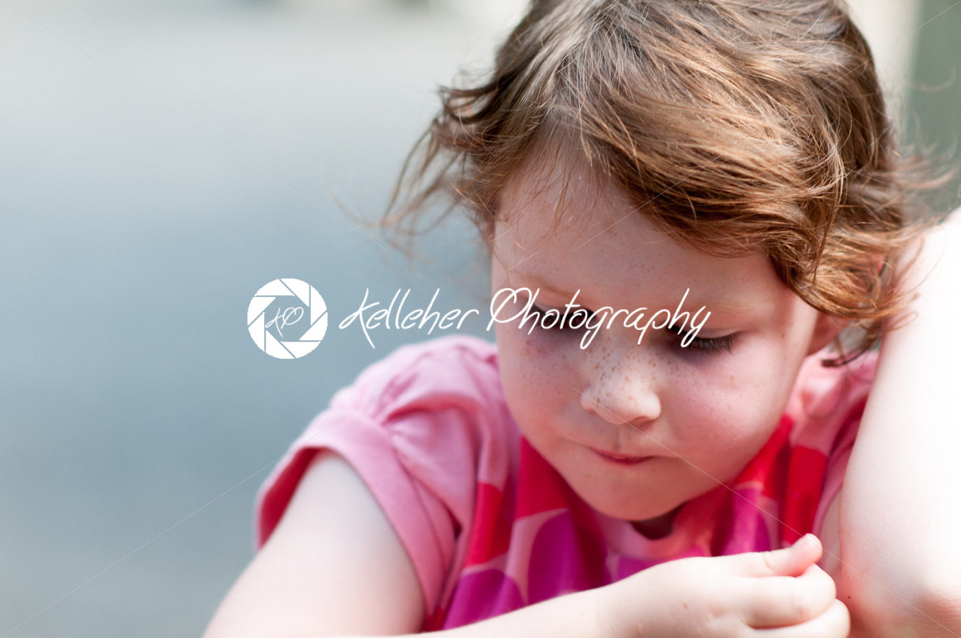 Portrait of young girl at sunset sitting down - Kelleher Photography Store