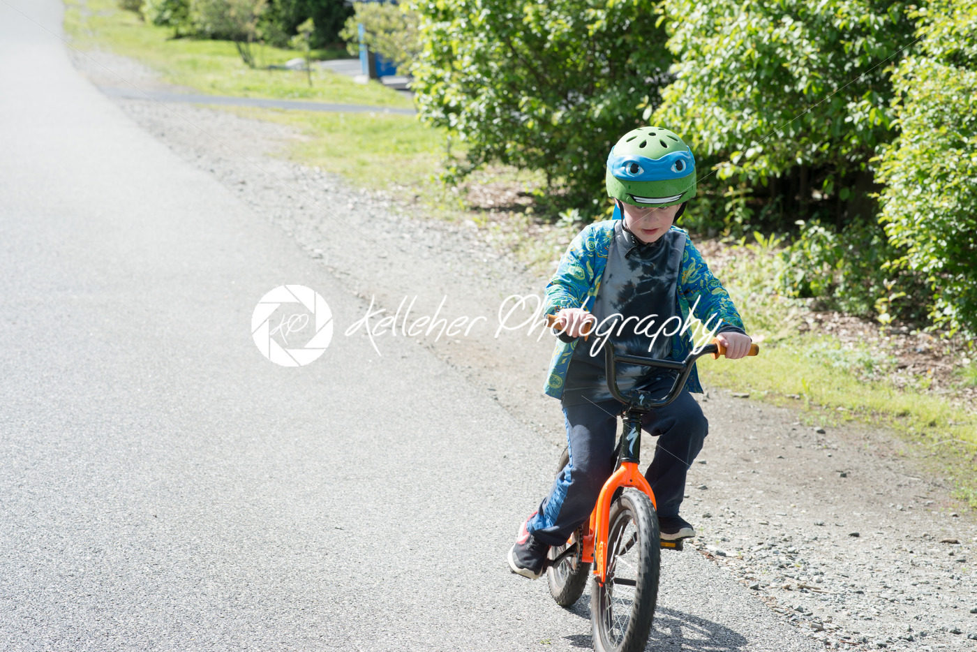 Young Boy Riding Bike on paved trail - Kelleher Photography Store