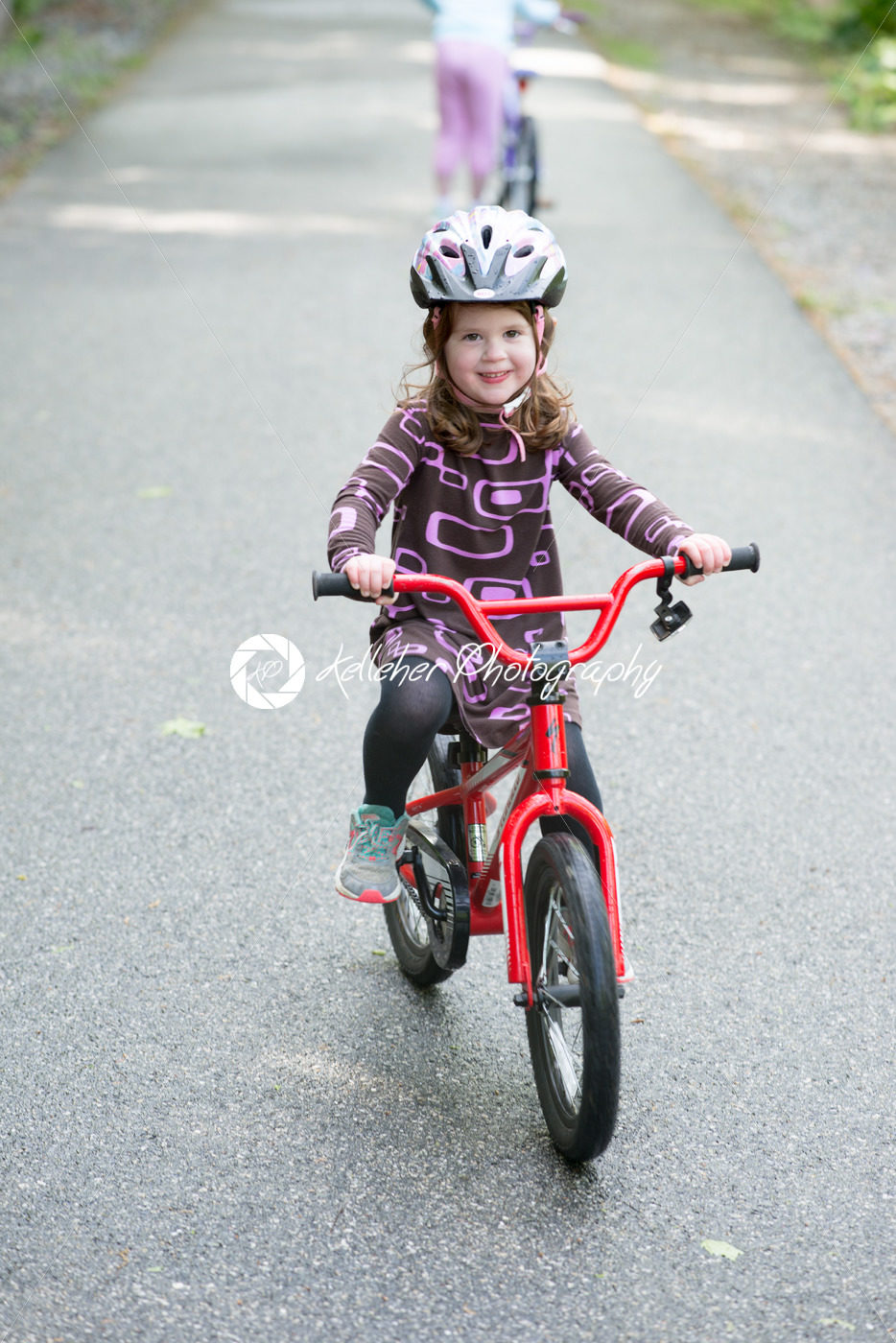 Young Girl Riding Bike on paved trail - Kelleher Photography Store