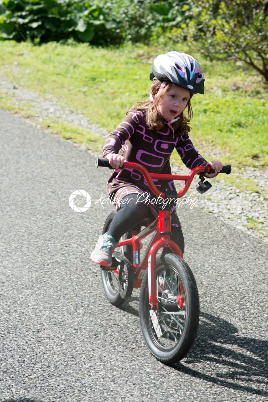 Young Girl Riding Bike on paved trail - Kelleher Photography Store