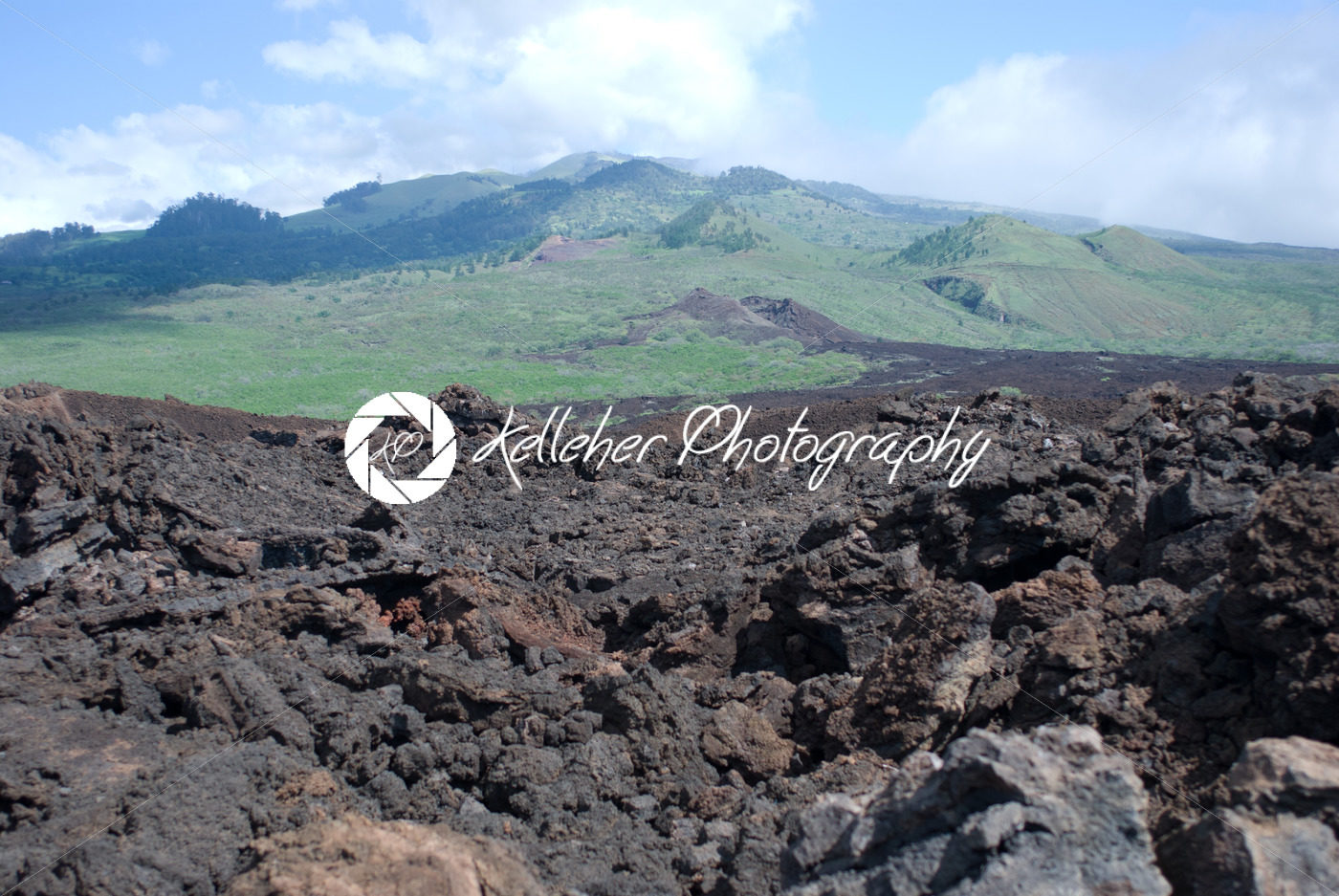 Black lava rocks line the shore at Keanae on the road to Hana in Maui, Hawaii - Kelleher Photography Store
