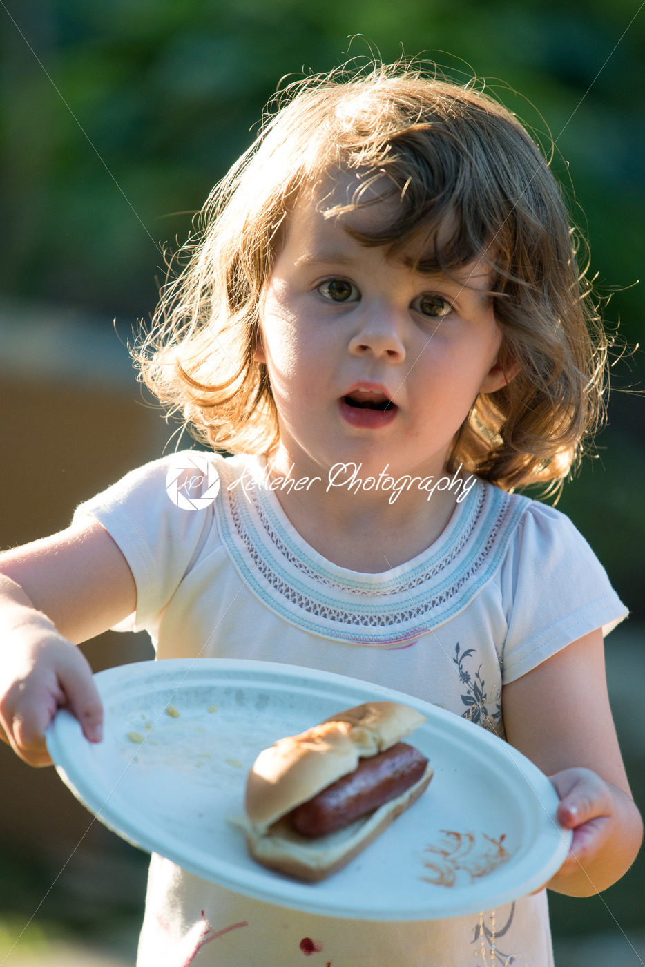 Cute toddler girl eating hot dog hotdog - Kelleher Photography Store