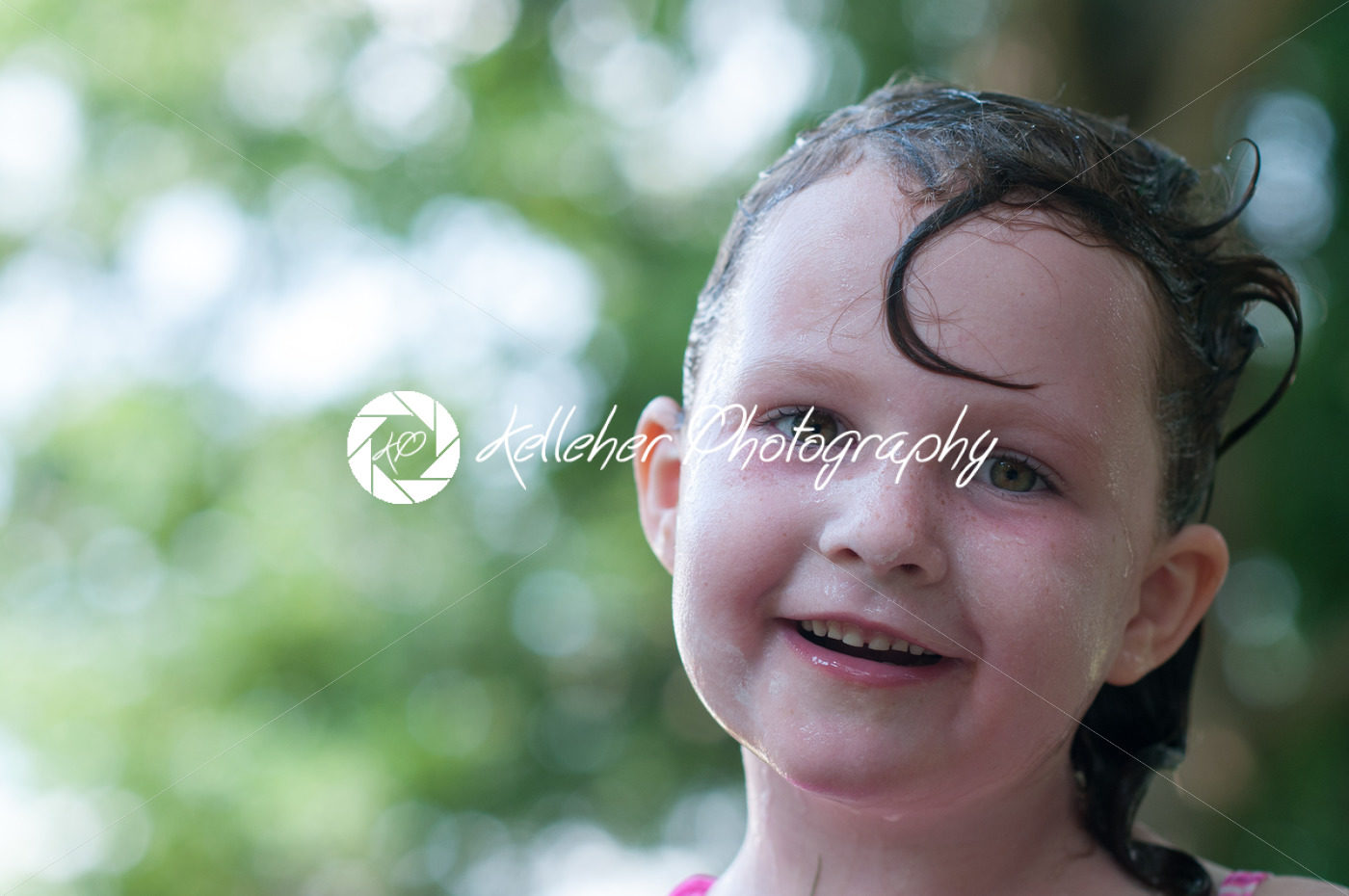 Little girl outside with wet hair after swimming - Kelleher Photography Store