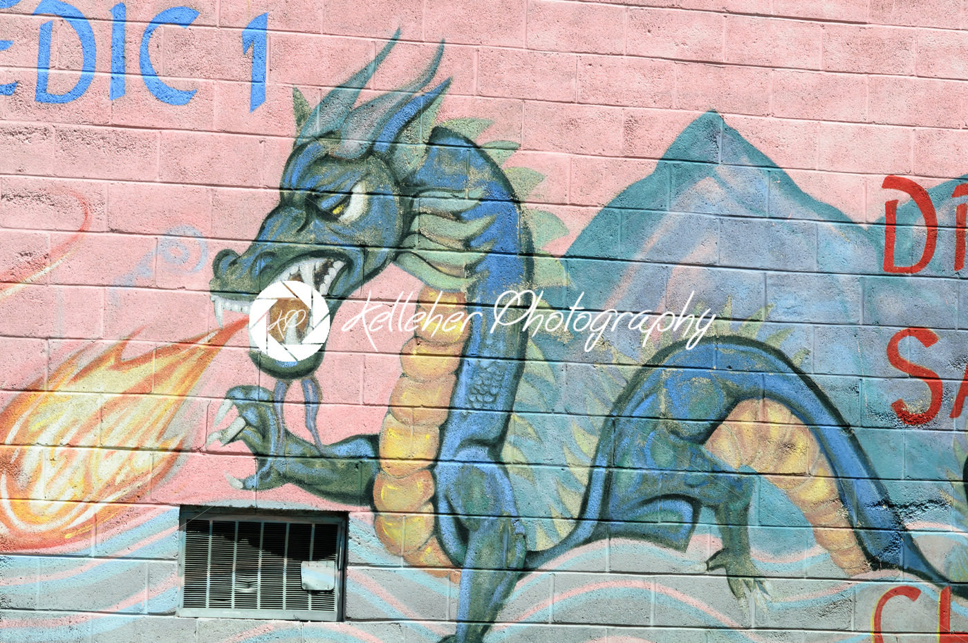 PHILADELPHIA, PA – MAY 14: Fire breathing dragon graffti artwork mural in the Chinatown section of downtown Philadelphia on May 14, 2015 - Kelleher Photography Store