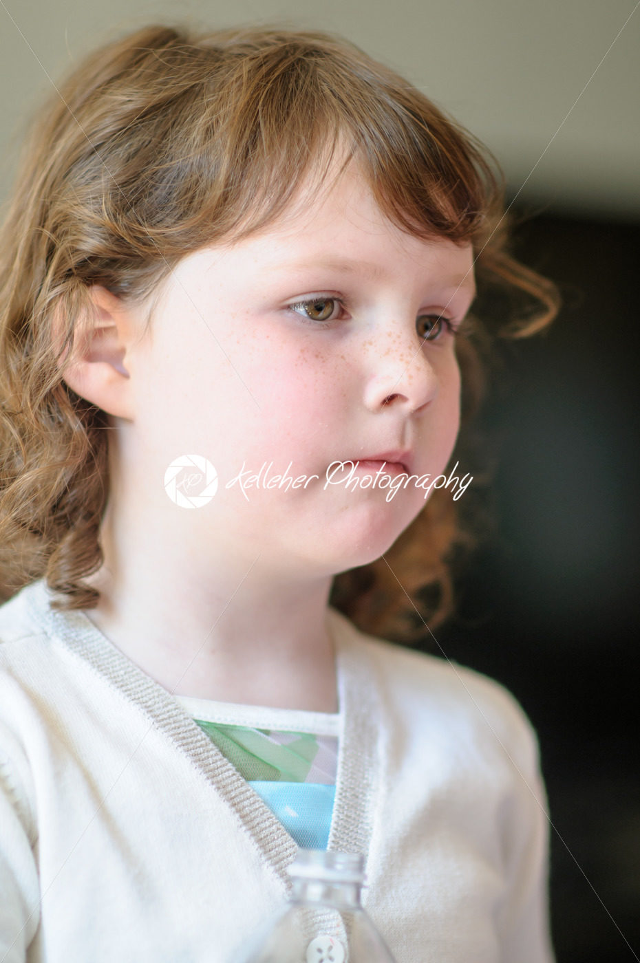 Portrait of a cute little girl inside - Kelleher Photography Store