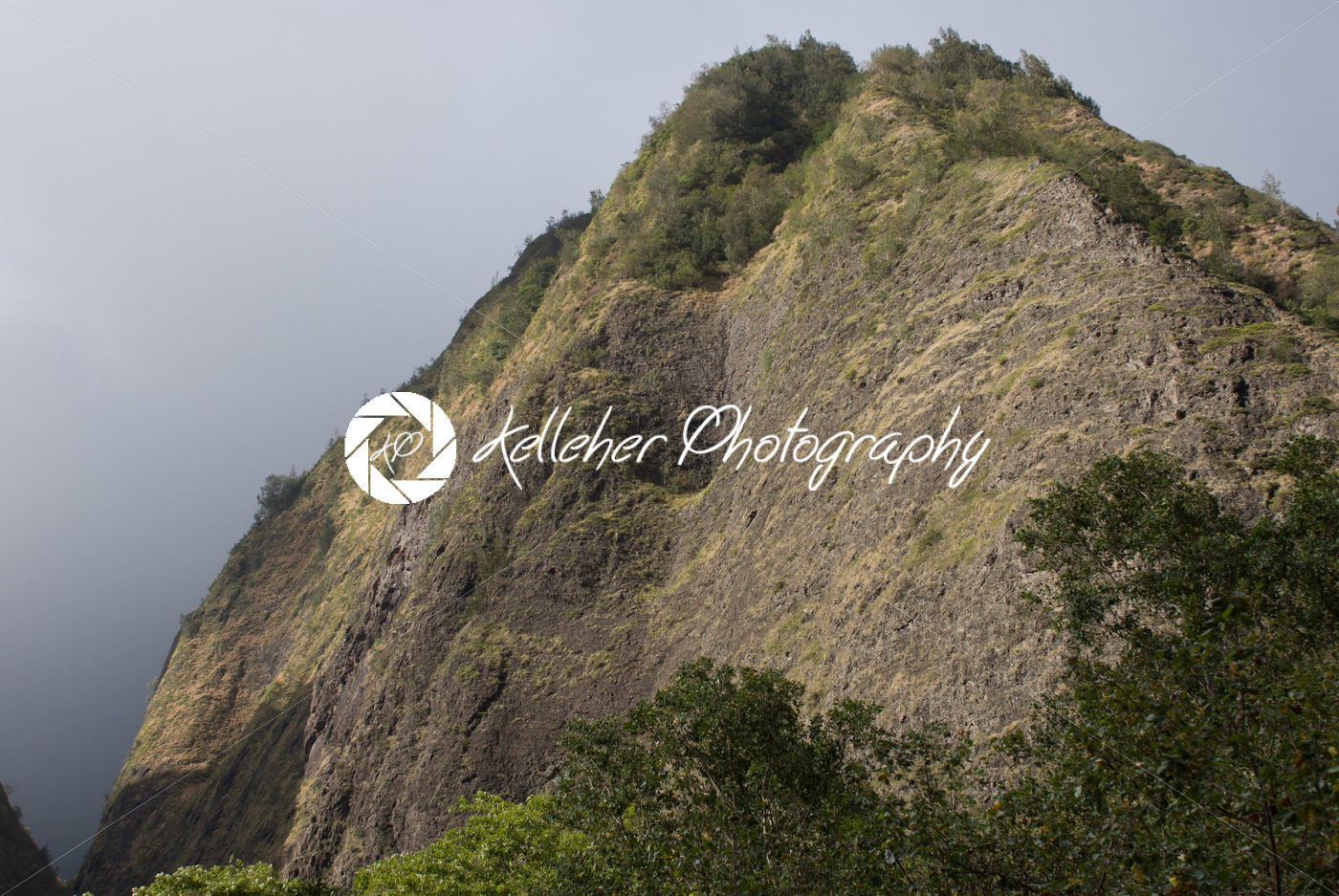 West Maui Mountains in the Ioa Valley reach into the clouds. Maui is one of many popular Hawaiian tourist destinations. - Kelleher Photography Store