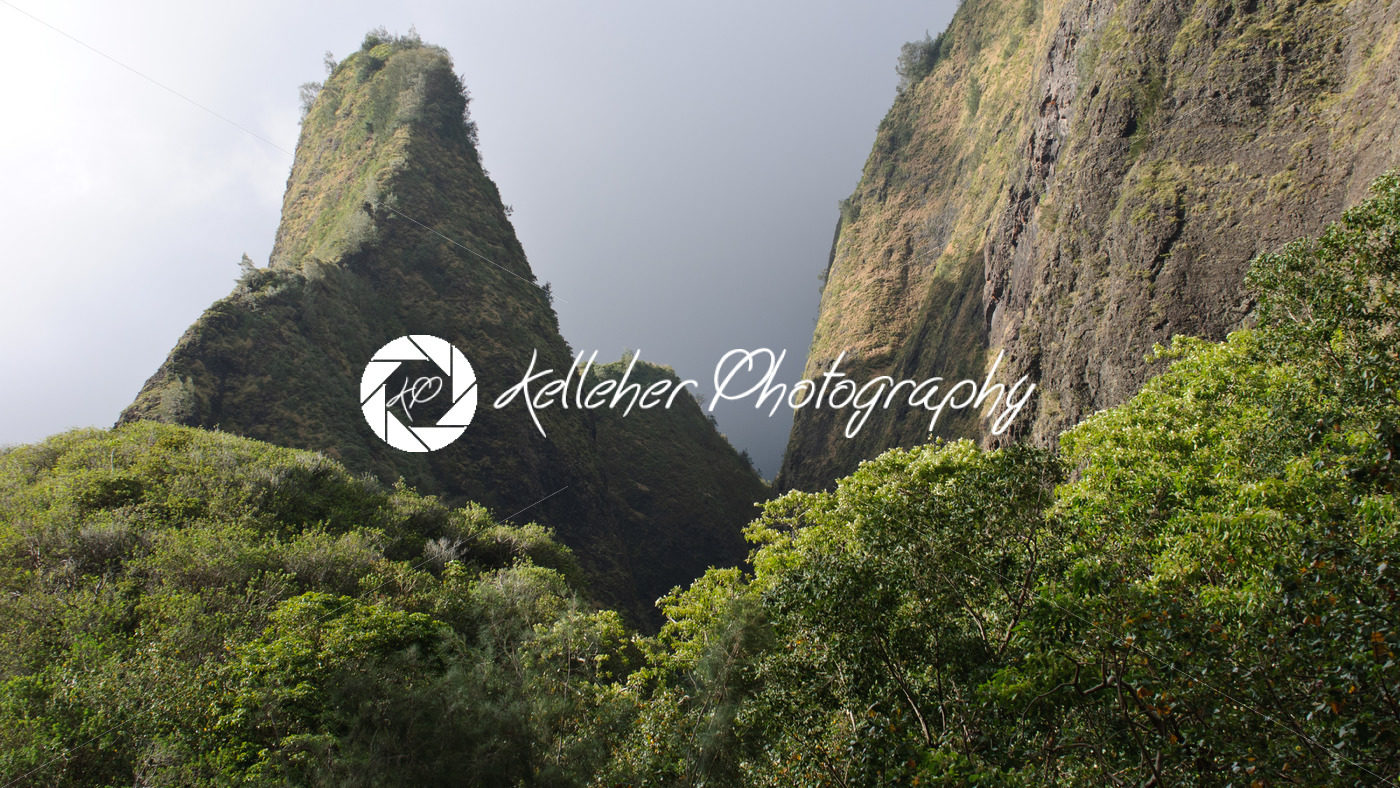 West Maui Mountains in the Ioa Valley reach into the clouds. Maui is one of many popular Hawaiian tourist destinations. - Kelleher Photography Store