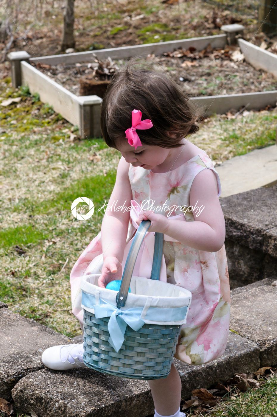 Young Girl Outside Dressed Up for Easter holding Basket - Kelleher Photography Store