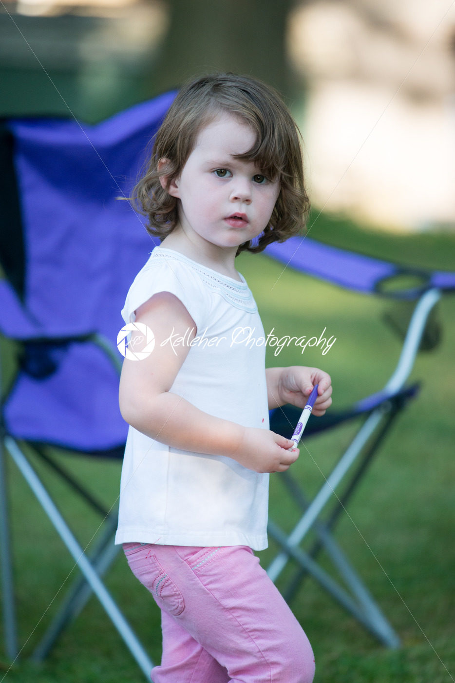 Young girl outside coloring with markers - Kelleher Photography Store