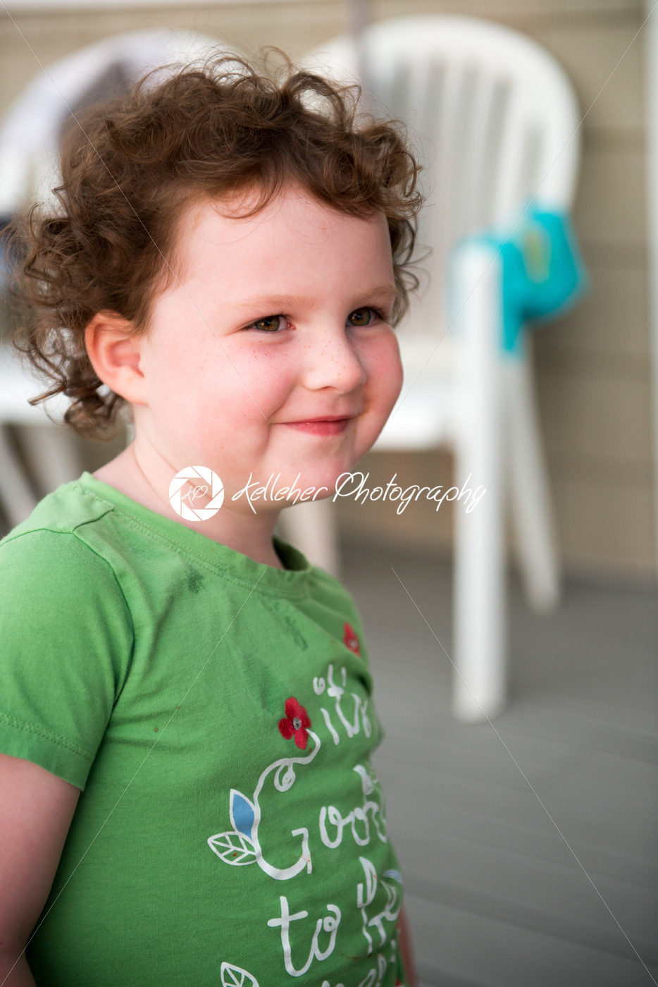 Young toddler girl on patio deck outside at sunset down at shore - Kelleher Photography Store