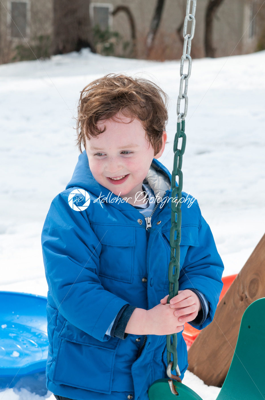 Happy toddler boy in warm coat on on snow day and having a fun in the winter outside, outdoor portrait - Kelleher Photography Store