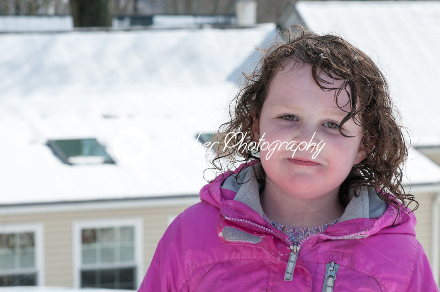 Happy toddler girl in warm coat on on snow day and having a fun in the winter outside, outdoor portrait - Kelleher Photography Store