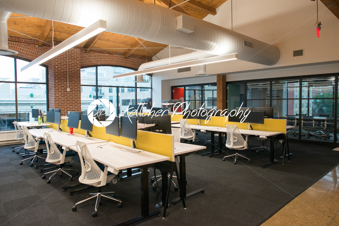 Trendy modern open concept loft office space with big windows, natural light and a layout to encourage collaboration, creativity and innovation - Kelleher Photography Store