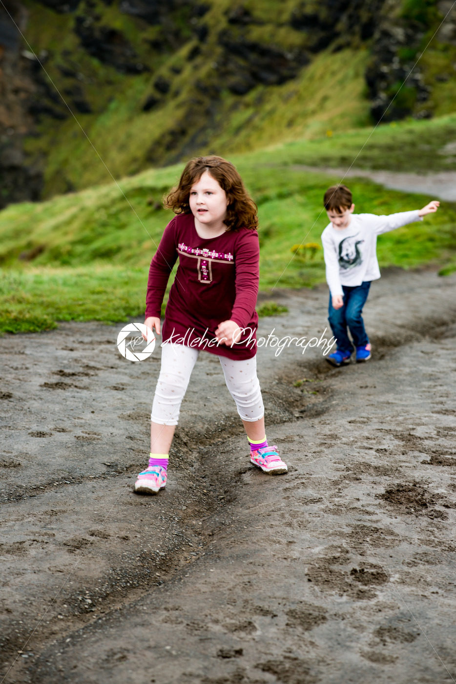 Boy and Girl walking up the Cliffs of Moher Tourist Attraction in Ireland - Kelleher Photography Store