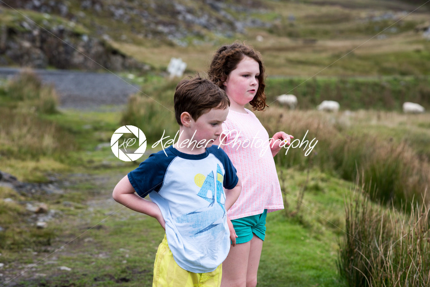 Boy and girl walking up the Slieve League Cliffs, County Donegal, Ireland - Kelleher Photography Store