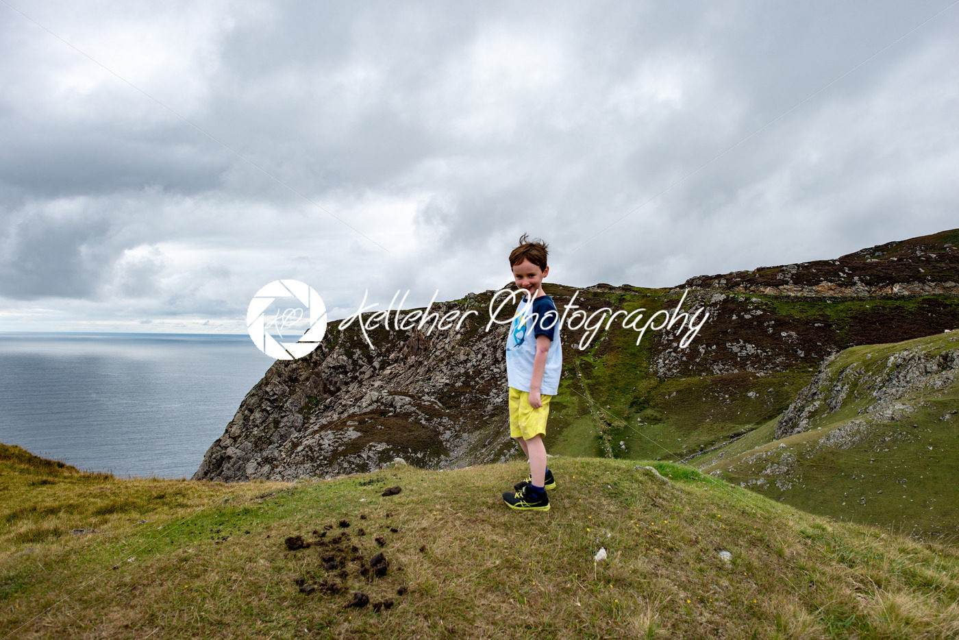 Boy looking out over Slieve League Cliffs, County Donegal, Ireland - Kelleher Photography Store