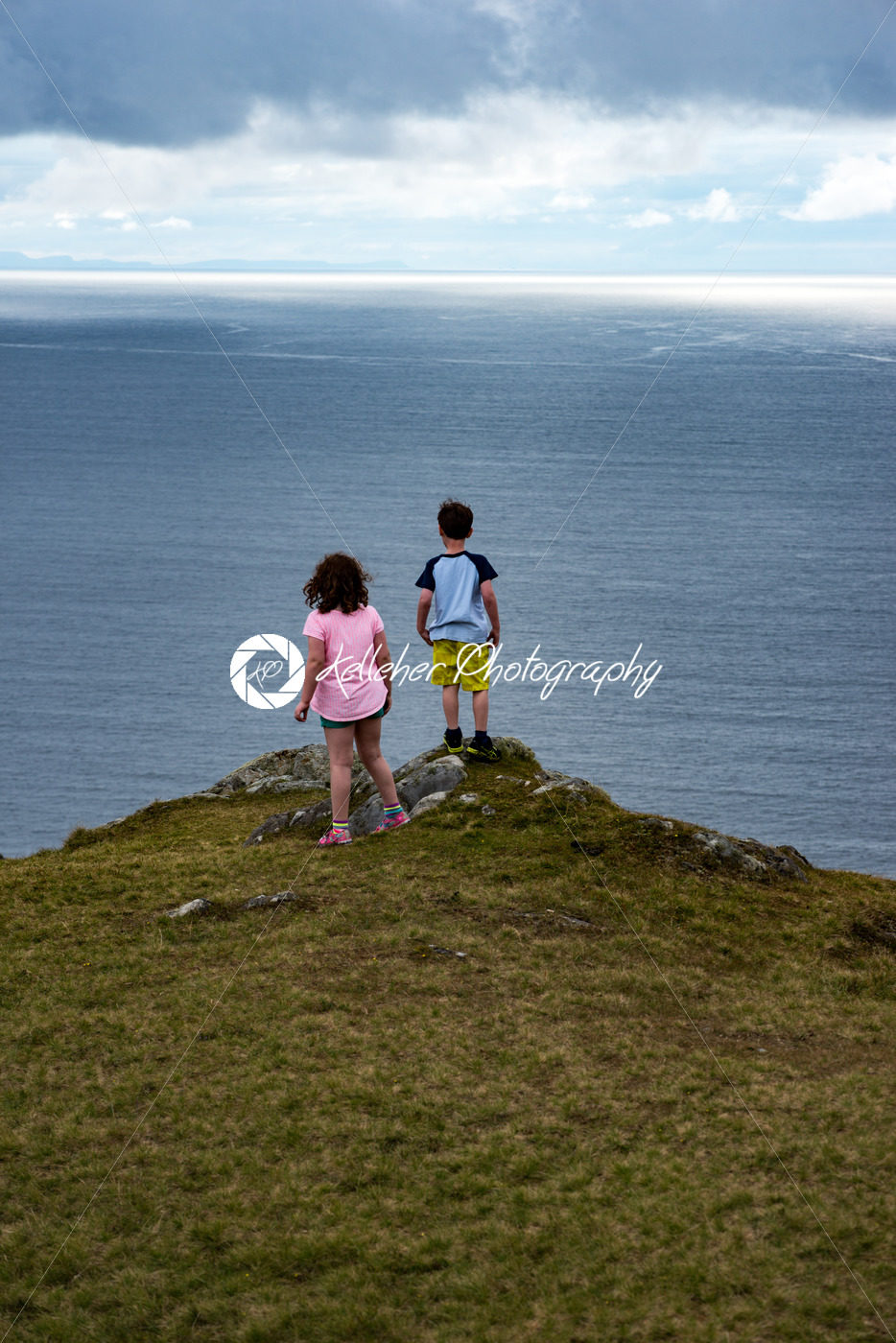 Girl and Boy looking out over Slieve League Cliffs, County Donegal, Ireland - Kelleher Photography Store