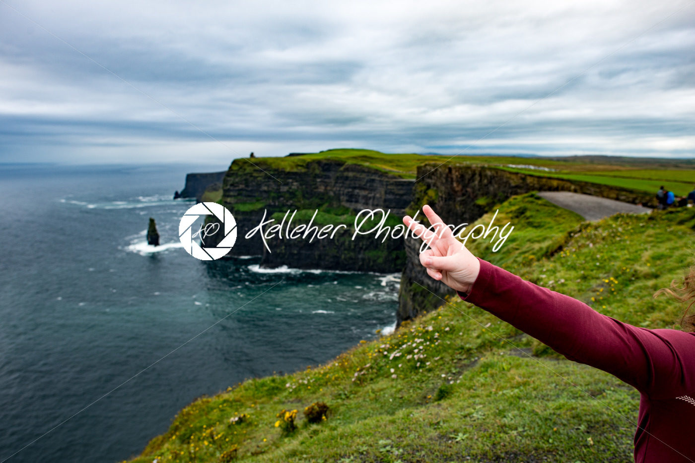 Girl at the Cliffs of Moher Tourist Attraction in Ireland - Kelleher Photography Store