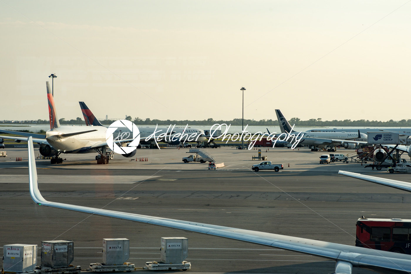 NEW YORK – AUGUST 17, 2017: Delta Airlines plane on tarmac at Terminal 4 at JFK International Airport - Kelleher Photography Store