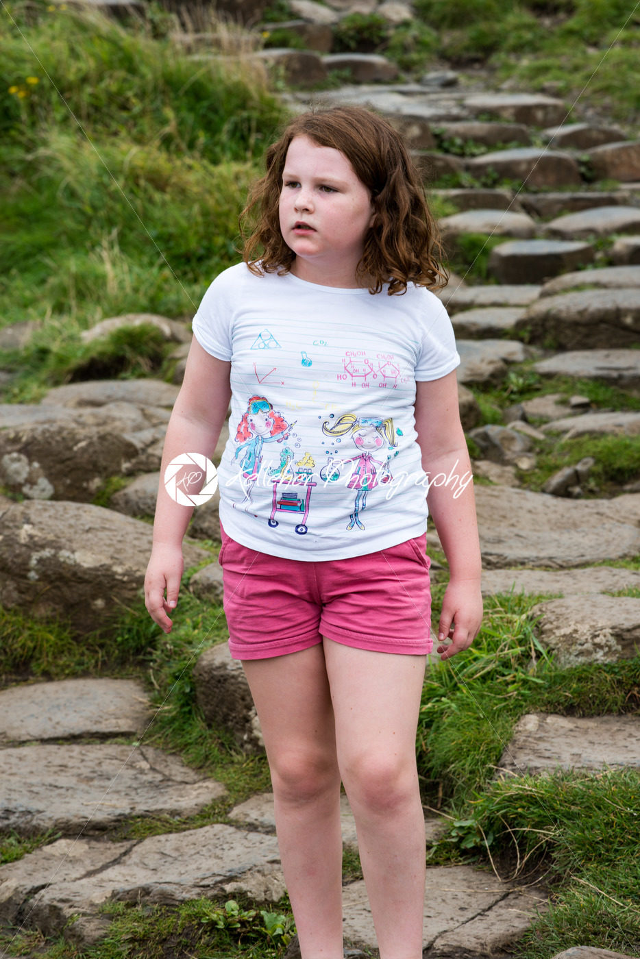Young Girl walking on the rocks at Giant’s Causeway - Kelleher Photography Store