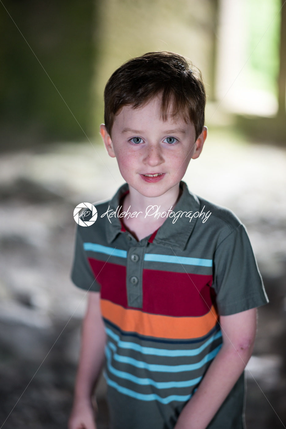 Young little boy portrait looking around inside castle - Kelleher Photography Store