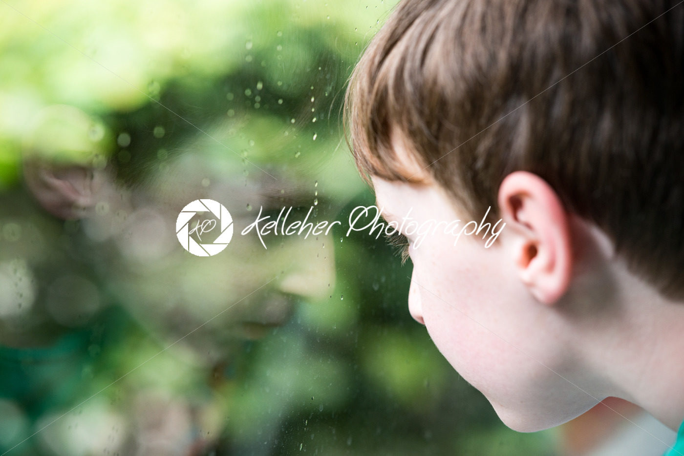 Young little boy portrait looking at something - Kelleher Photography Store