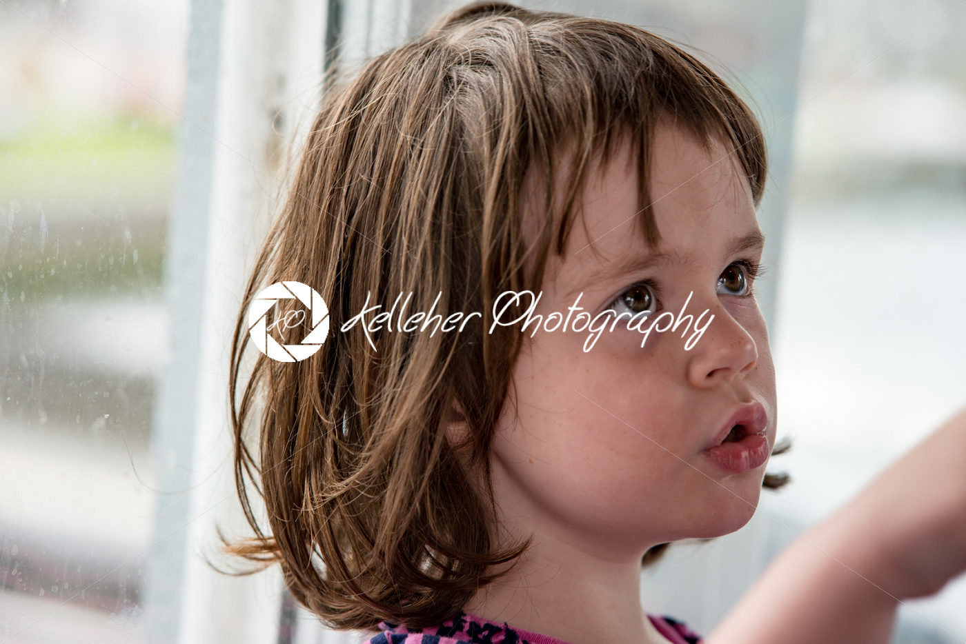 Young little girl portrait looking out window - Kelleher Photography Store