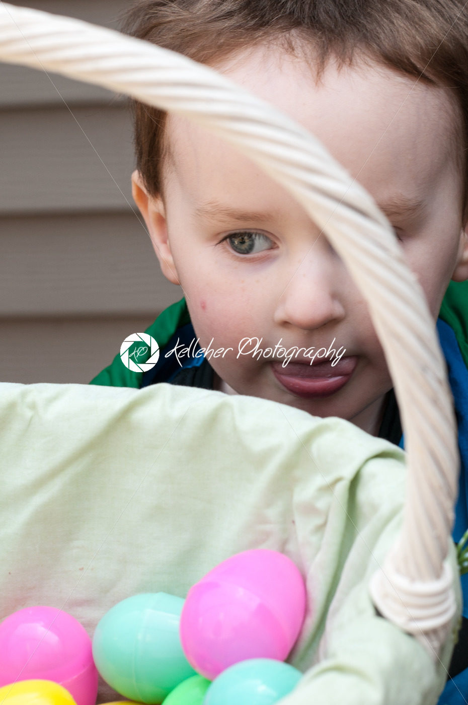 Young little toddler boy with basket of easter eggs - Kelleher Photography Store
