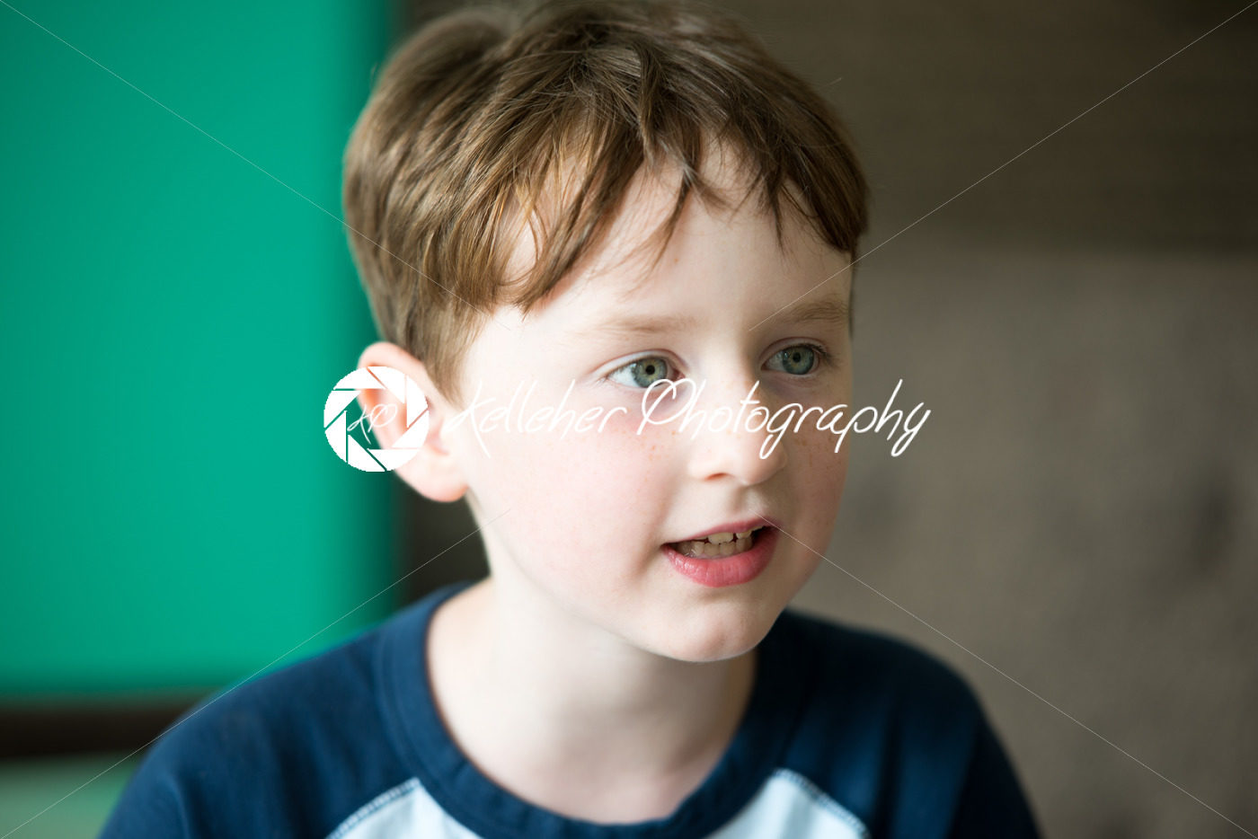 Close-up portrait of a cute boy with blue eyes - Kelleher Photography Store