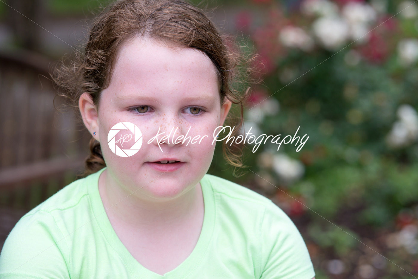 Close-up portrait of a cute redhead girl thinking - Kelleher Photography Store