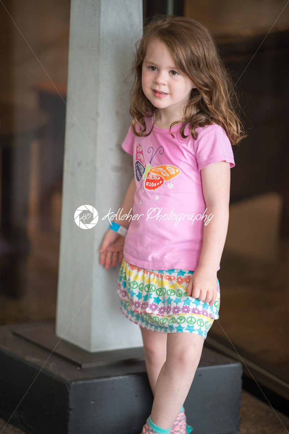 Cute young girl wearing pink top - Kelleher Photography Store