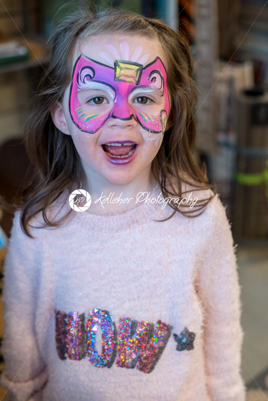 Pretty excited cute young girl with face painting like a butterfly - Kelleher Photography Store
